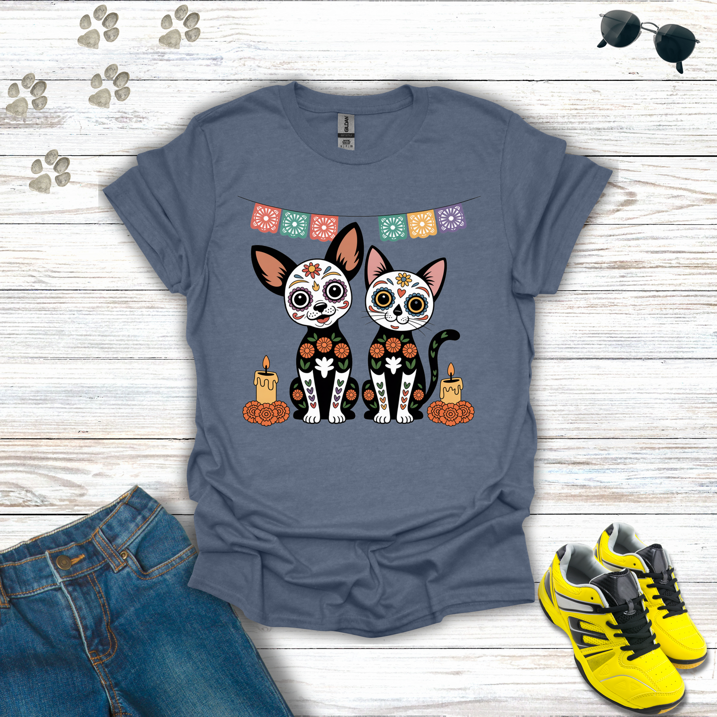 Heather Indigo t-shirt Sugar Skull Chihuahua and Cat T-Shirt design with candles, marigolds, and papel picado Día de los Muertos theme
